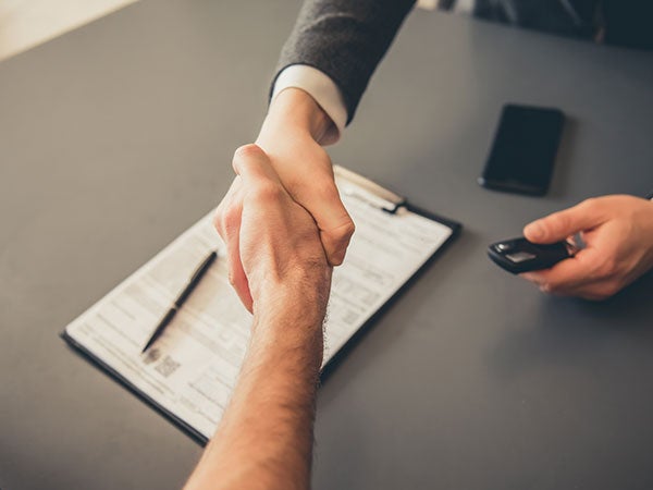 Customer reviewing financing options for a new Ford vehicle