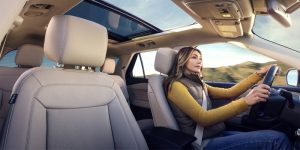 Interior view of a woman driving the 2024 Ford Explorer.
